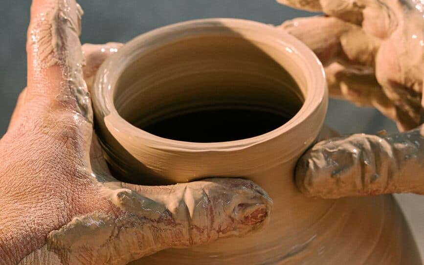 Graphic designer making clay pot. How to survive in graphic design